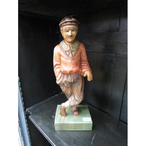 2271 - A carved wooden figure of a golfer       (R) £20