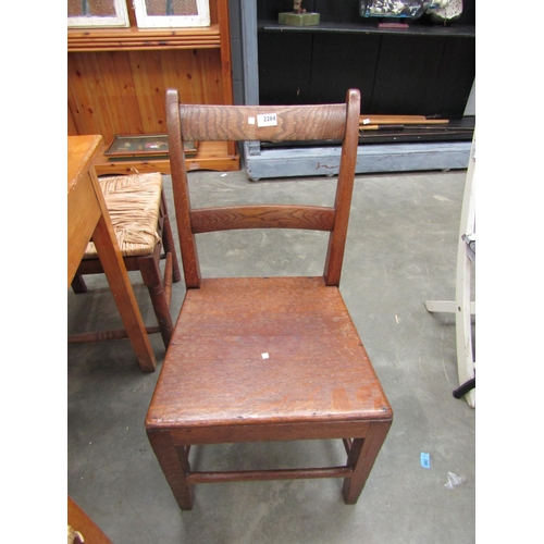 2284 - A 19th Century mahogany bidet (minus liner) , and a oak solid seat kitchen chair