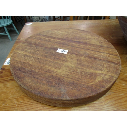 2290 - A round rustic wooden chopping block