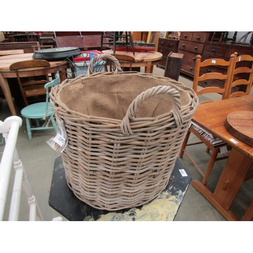 2292 - A hessian lined twin handled wicker basket, 45cm diameter