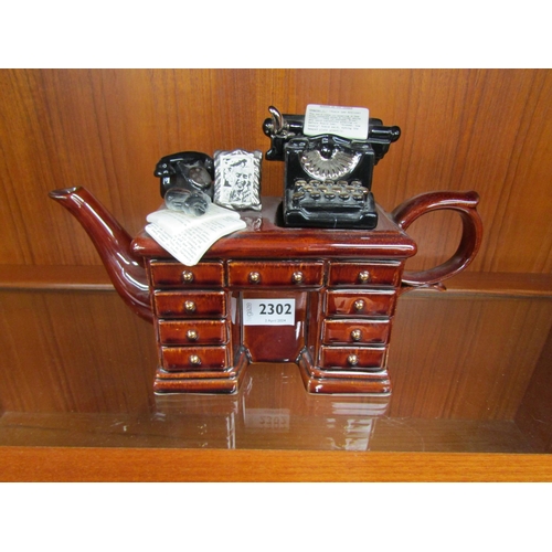 2302 - A novelty tea pot as an antique desk         (E) £15-20