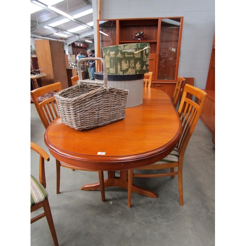 2317 - A teak extending dining table and six chair frames