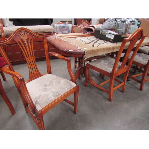 2324 - A yew wood extending table on ball and claw feet with 6 (4+2) dining chairs      (E) £10-15