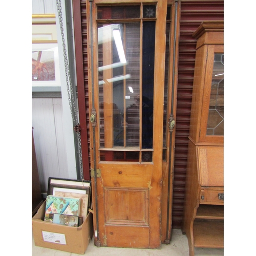 2366 - A pair of Victorian pine interior doors, stained and clear glass to top section, brass ornate handle... 