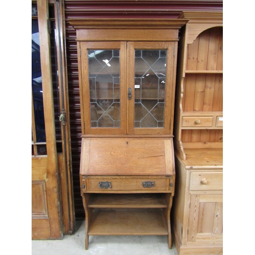 2367 - An Edwardian inlaid oak bureau bookcase