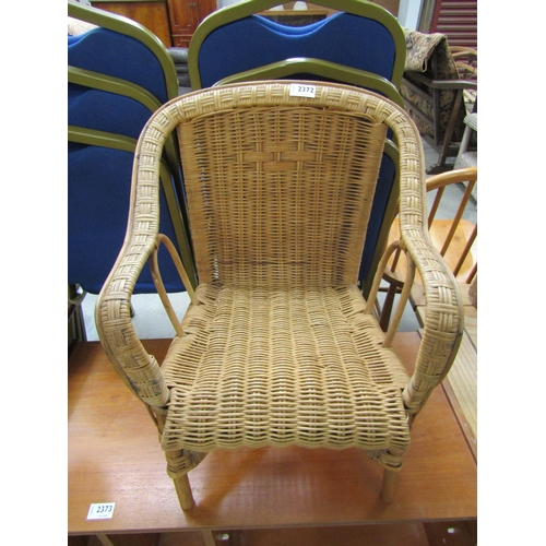 2372 - A child's wicker chair     (C)