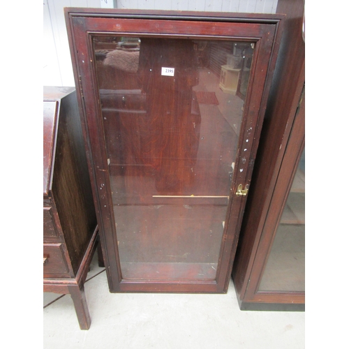 2395 - A Victorian mahogany display case, interior shelves missing original glass, paper label to side.  12... 