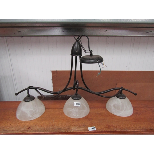 2406 - A metal three arm chandelier      (E) £5-10