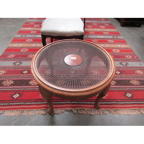 2414 - A 1920's circular canework topped side table