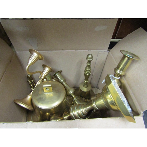 2070 - A box of brass candlesticks and a bell