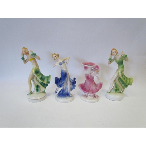 1352 - A quantity of hard paste porcelain dancing female figures