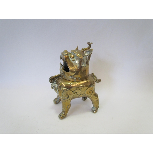 1356 - An Oriental brass Quilin style censer, 16cm high