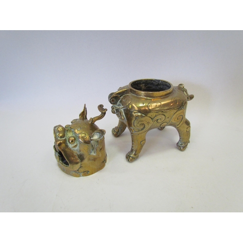 1356 - An Oriental brass Quilin style censer, 16cm high