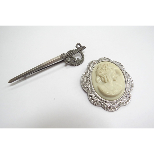 7067 - A Charles Horner silver framed cameo brooch and a Charles Horner sword brooch    (C)