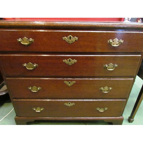 4086 - A George II oak caddy top chest of four graduating long drawers on bracket feet, stamped RW 53 to si... 