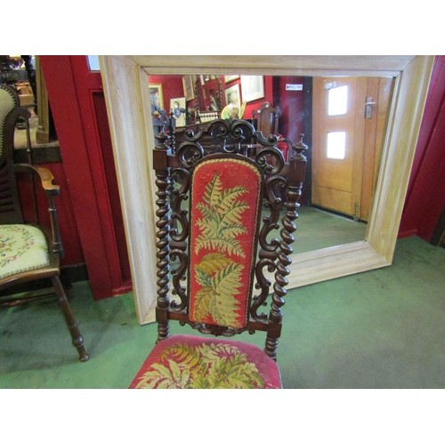 4009 - A Circa 1860 carved walnut chair with barley twist and carved supports on cabriole fore legs, uphols... 