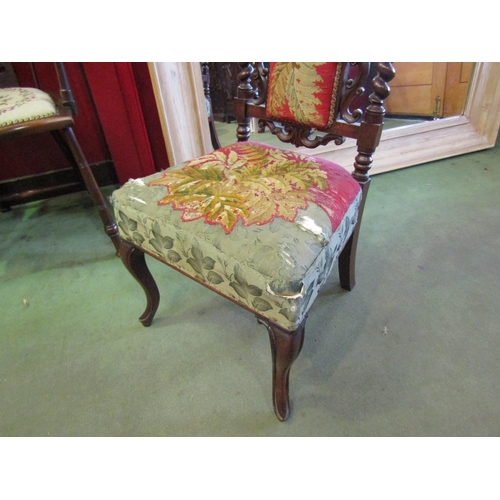 4009 - A Circa 1860 carved walnut chair with barley twist and carved supports on cabriole fore legs, uphols... 