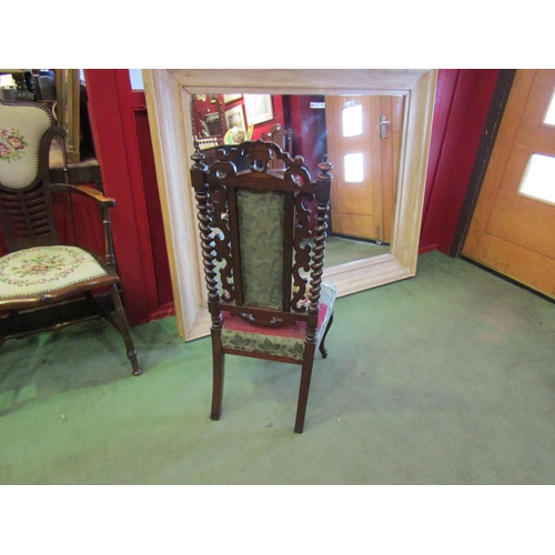 4009 - A Circa 1860 carved walnut chair with barley twist and carved supports on cabriole fore legs, uphols... 