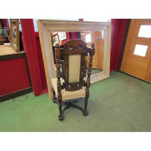 4013 - An 18th Century revival carved oak back rest chair on carved and turned fore legs united by an 