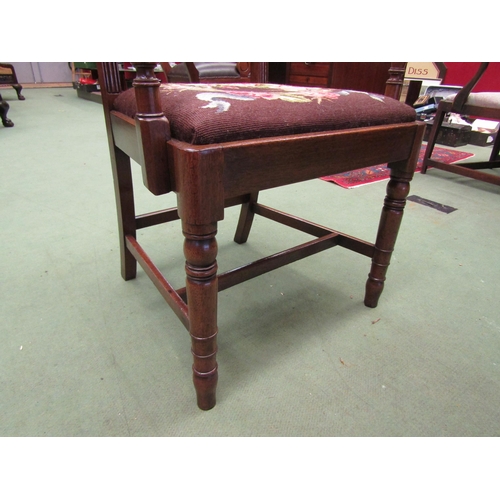 4016 - A George III flame mahogany Suffolk ball back armchair, the reeded arms on turned supports and fore ... 