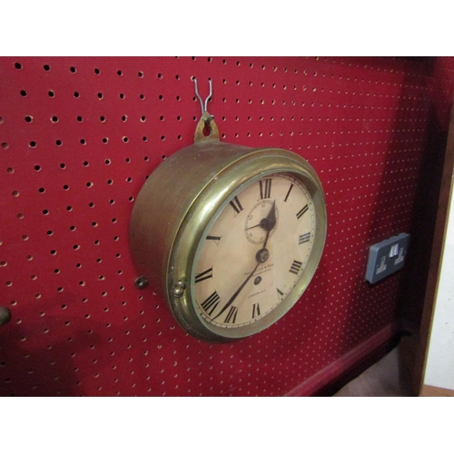 4032 - A Reynolds & Son, London, brass cased ship's clock    (R) £80