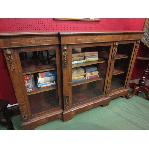 4039 - A Victorian walnut breakfront credenza with satinwood inlay and gilt ormolu embellishment on bracket... 