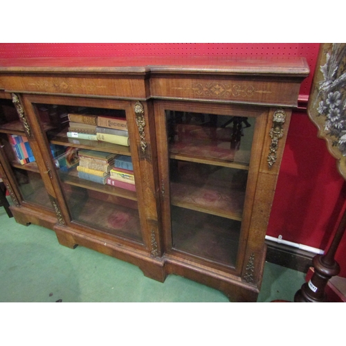 4039 - A Victorian walnut breakfront credenza with satinwood inlay and gilt ormolu embellishment on bracket... 