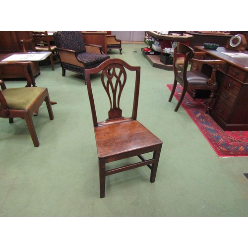 4056 - A Circa 1800 pair of East Anglian oak chairs with pierced central splat, the flat seat on square leg... 