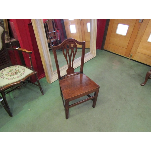 4056 - A Circa 1800 pair of East Anglian oak chairs with pierced central splat, the flat seat on square leg... 