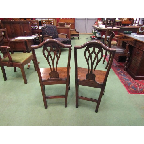 4056 - A Circa 1800 pair of East Anglian oak chairs with pierced central splat, the flat seat on square leg... 