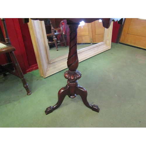 4060 - A late Victorian mahogany octagonal top wine/lamp table with shaped apron over a baluster turned spi... 