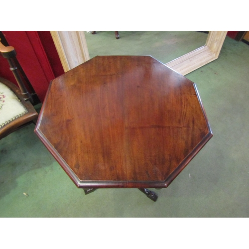 4060 - A late Victorian mahogany octagonal top wine/lamp table with shaped apron over a baluster turned spi... 