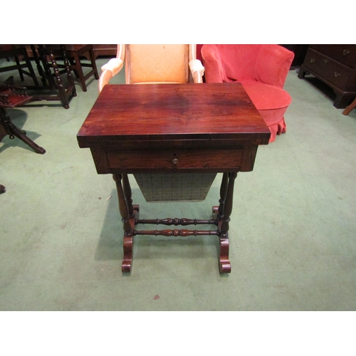 4065 - A Circa 1840 rosewood games/work table, the fold over swivel top with inlaid backgammon/chess and cr... 