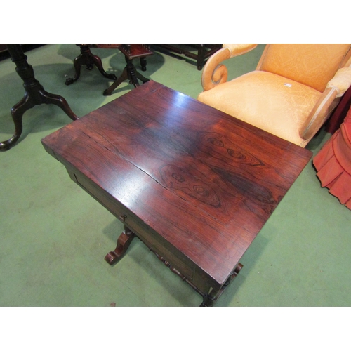 4065 - A Circa 1840 rosewood games/work table, the fold over swivel top with inlaid backgammon/chess and cr... 