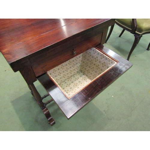 4065 - A Circa 1840 rosewood games/work table, the fold over swivel top with inlaid backgammon/chess and cr... 