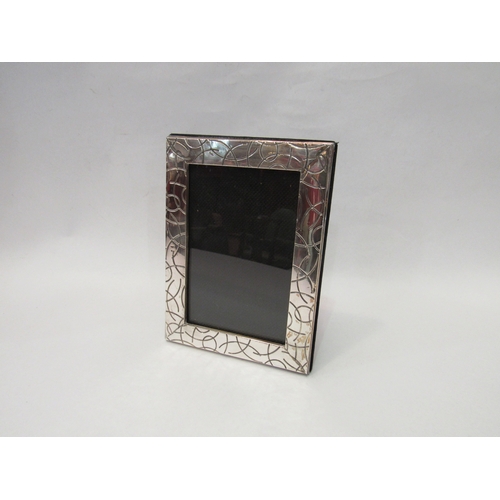 4063 - A Middle Eastern silver photograph frame with modernist design, stamped 925, 15.5cm x 11.5cm