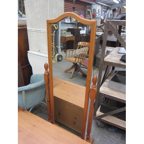 2445 - A modern pine cheval mirror with turned spindles