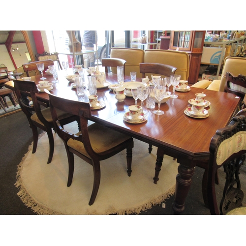 1099 - A Victorian mahogany extending dining table on turned legs to castors with matched extra leaf, 73cm ... 