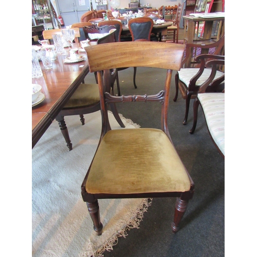 1100 - A set of four mahogany William IV style chairs and a pair of matched examples (6)