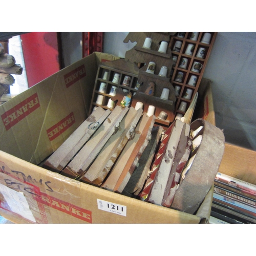 1158 - Eleven small shelves containing a quantity of assorted thimbles, mostly ceramic