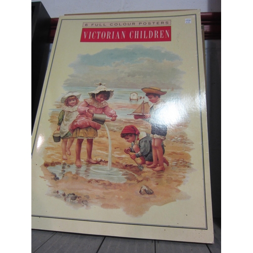 1163 - Four framed colour posters of Victorian children at play, 