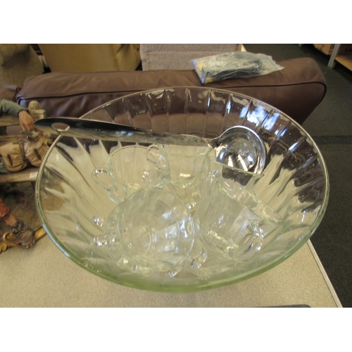 1376 - A punch bowl with twelve cups and an Oneida ladle