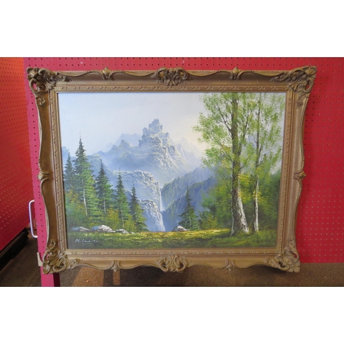 1051 - An oil on board, trees and mountain scene, in gilt frame, signed lower left, 50cm x 70cm image size ... 