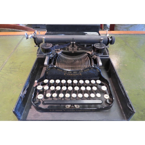 1090 - An L.C. Smith & Corona cased typewriter