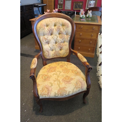 1092 - A 1930's Victorian style spoon-back chair with serpentine seat, floral upholstery