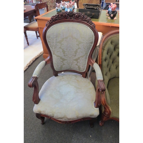 1093 - A 19thc walnut framed button back salon chair and a carved armchair, with backrest repair (2)