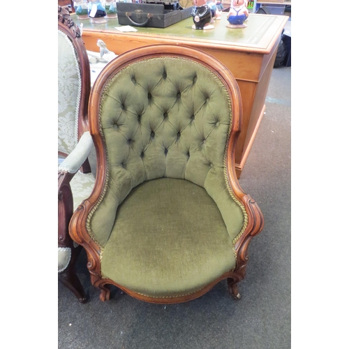 1093 - A 19thc walnut framed button back salon chair and a carved armchair, with backrest repair (2)