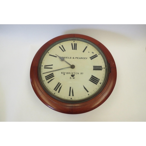 1132 - A Daniels & Pearcey, 60A Brixton Rd., S.W. mahogany cased dial clock.  29cm dial.  With key, no pend... 