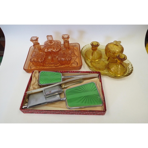 1141 - Two moulded glass dressing table sets, a mirror and brush set, compact, etc