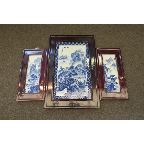 1147 - A triptych of blue and white Chinese porcelain plaques, framed, central plaque 69cm x 44cm total, ot... 